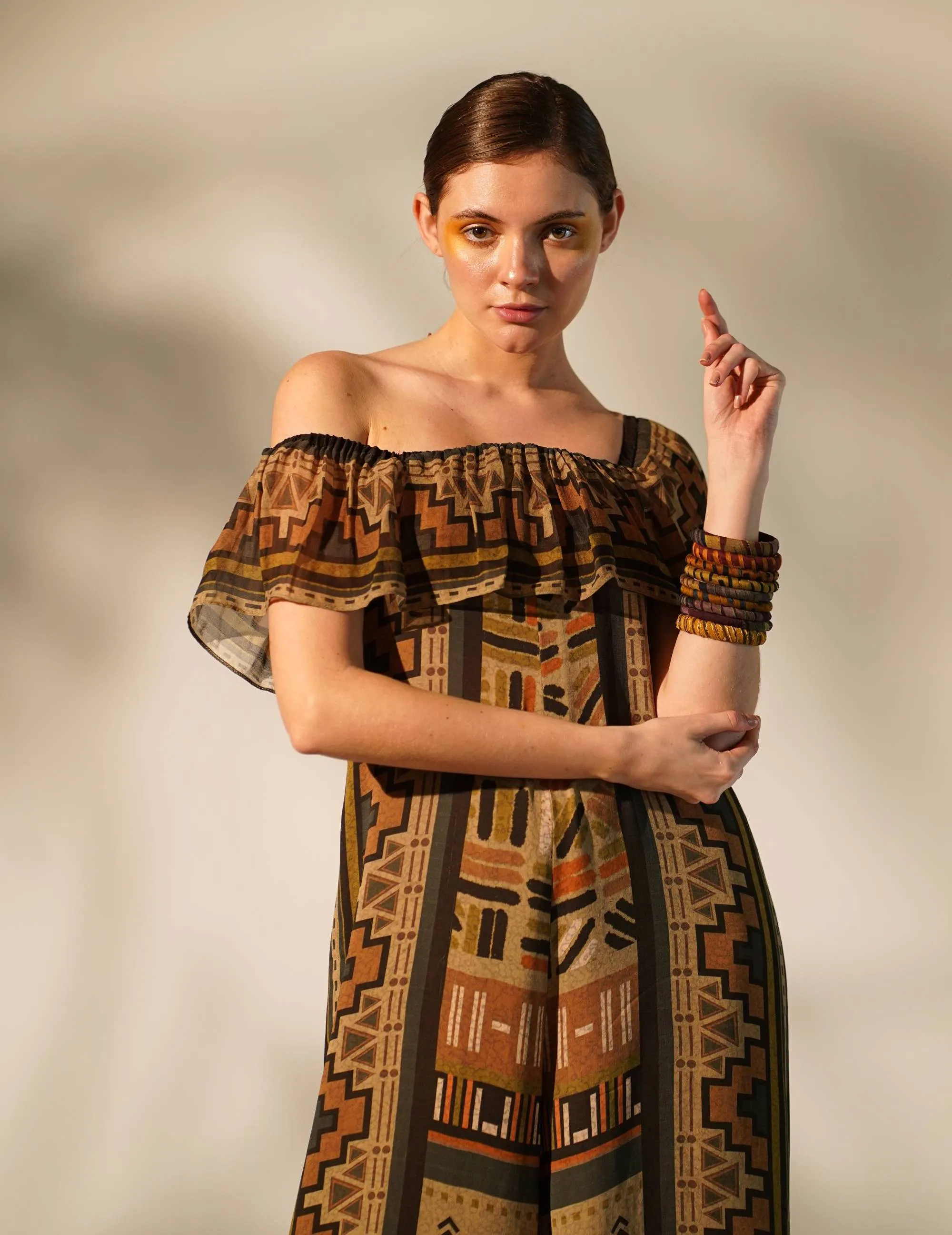 Green aztec print jumpsuit