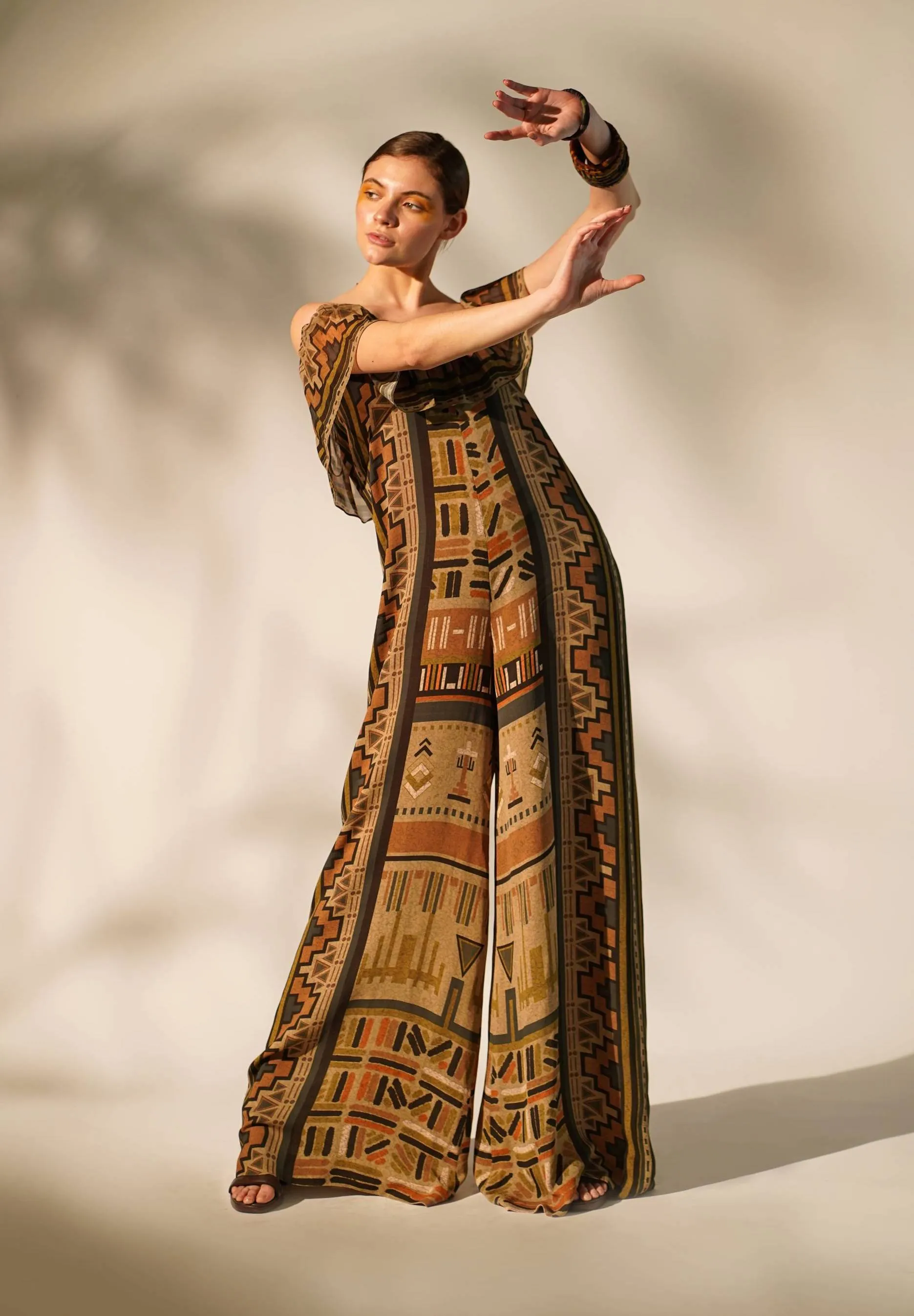 Green aztec print jumpsuit