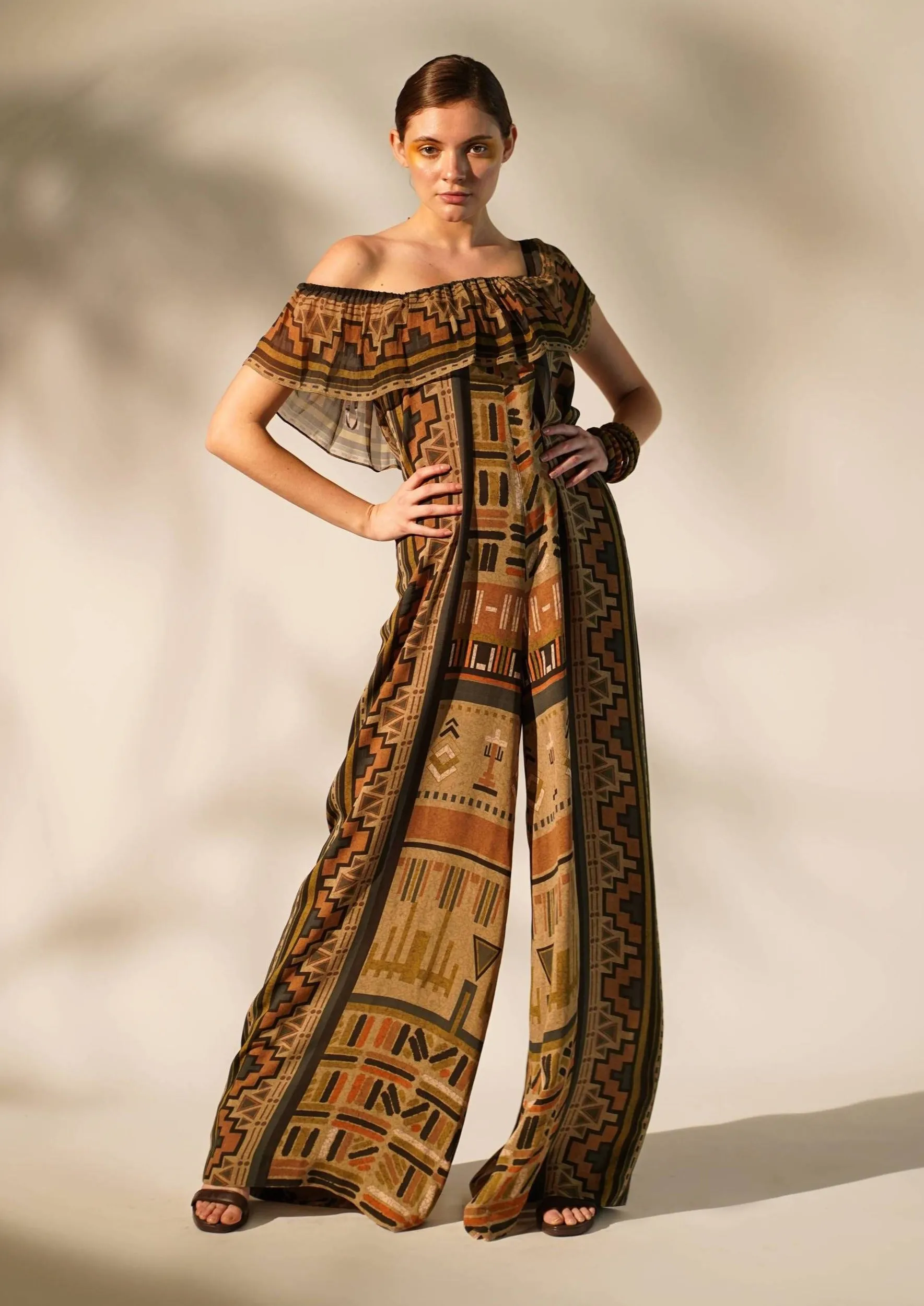 Green aztec print jumpsuit