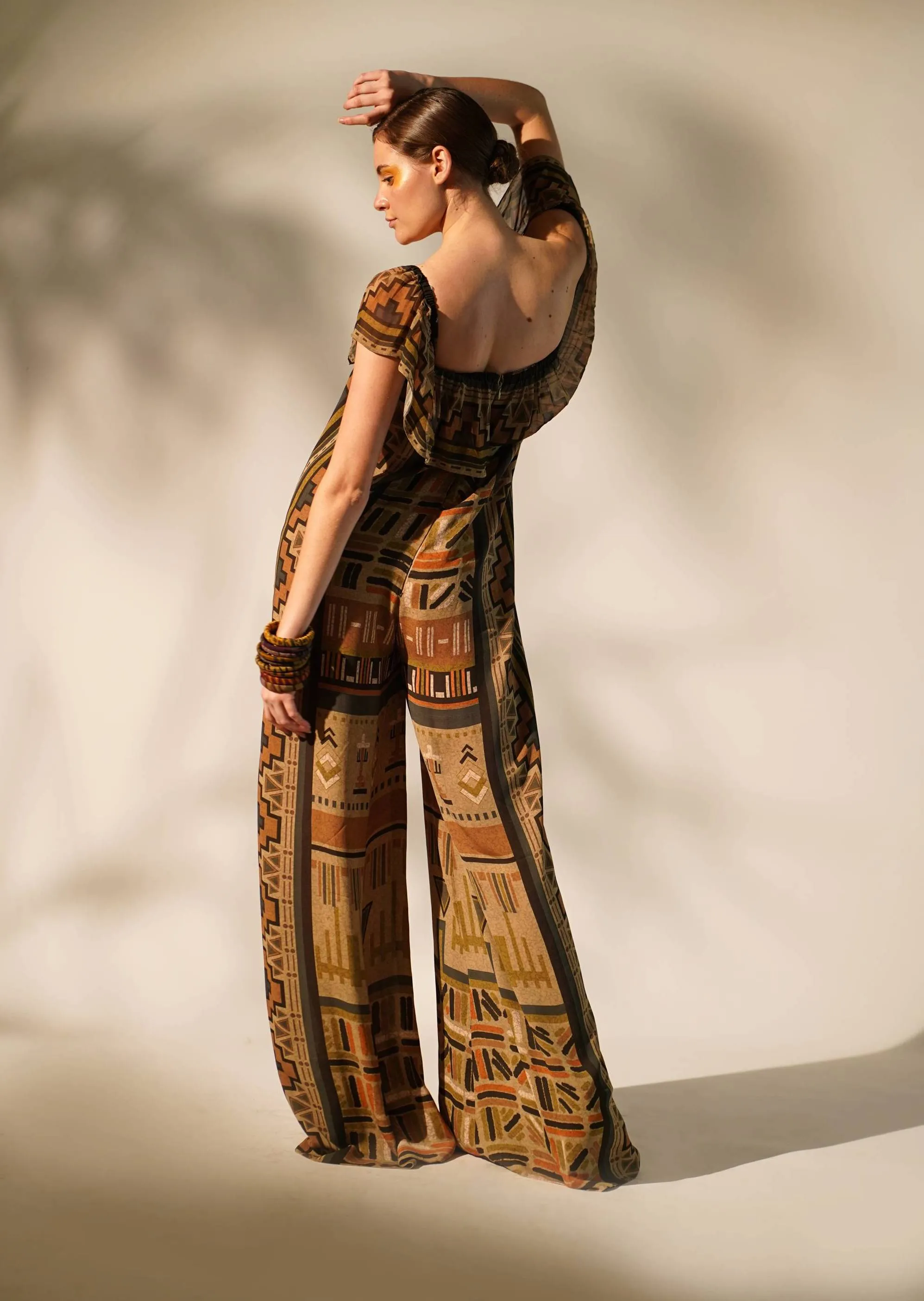 Green aztec print jumpsuit