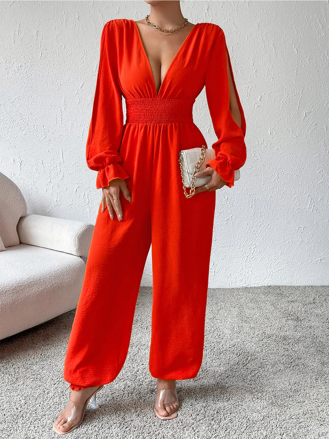 Size Medium Red/Orange Smocked Long Sleeve Jumpsuit