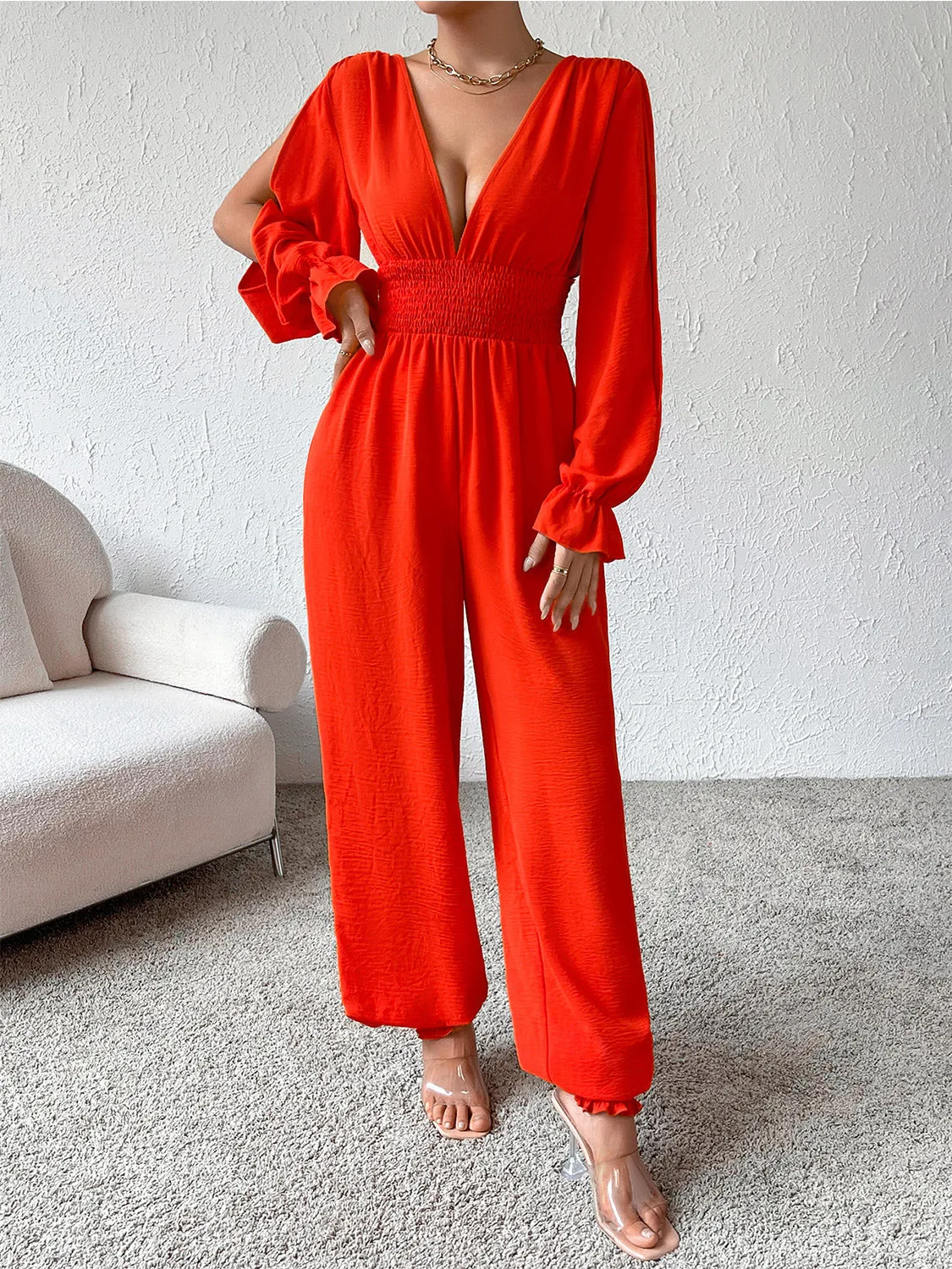Size Medium Red/Orange Smocked Long Sleeve Jumpsuit